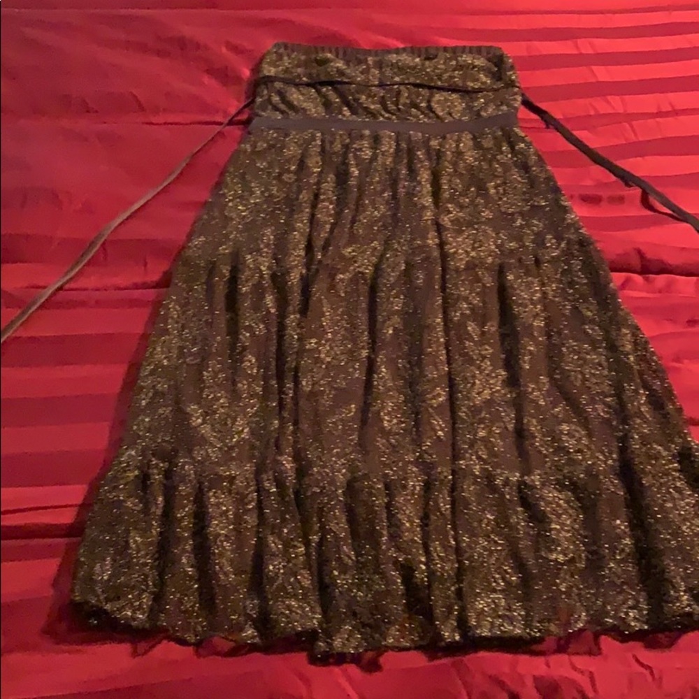 Strapless elegant medium length dress.